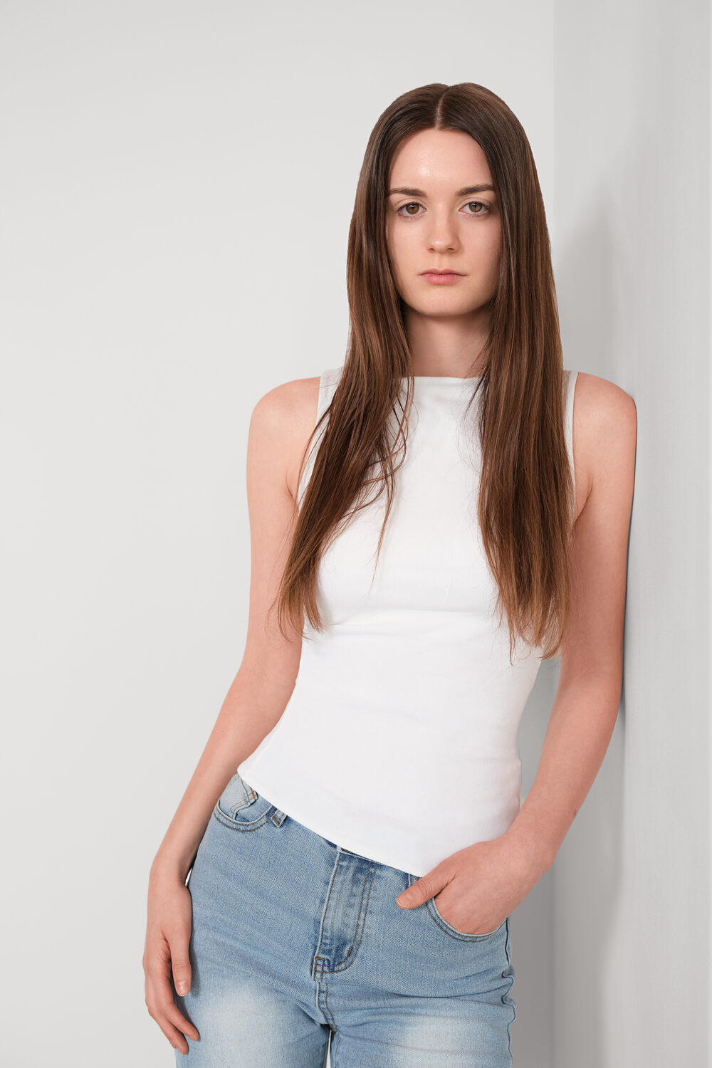 Studio portrait session on white backdrop