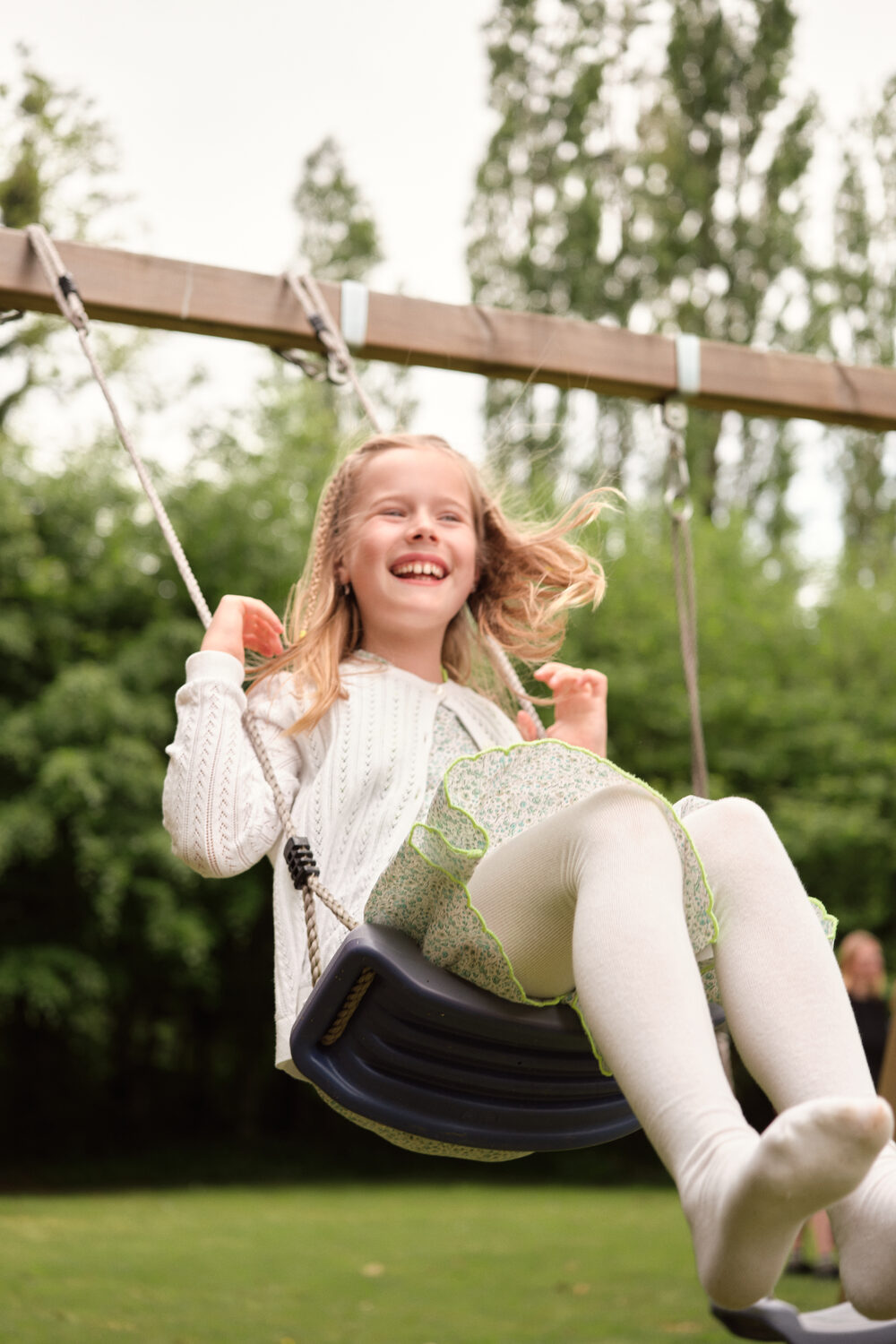 Girl on a swing — family session