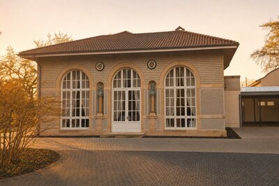 Orangerie de Mondorf glasshouse exterior facing the spa park